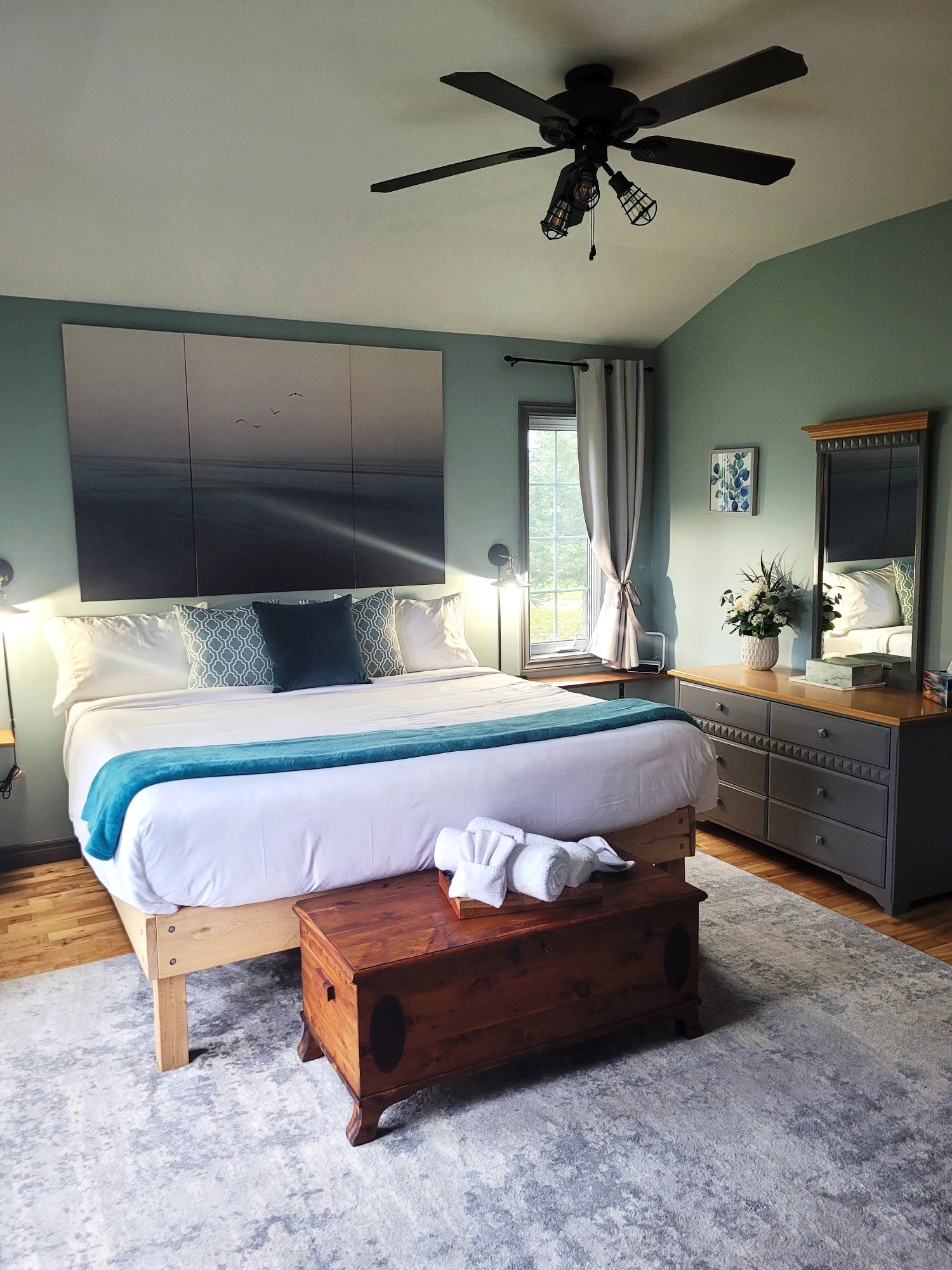Farmhouse Primary bedroom with king bed